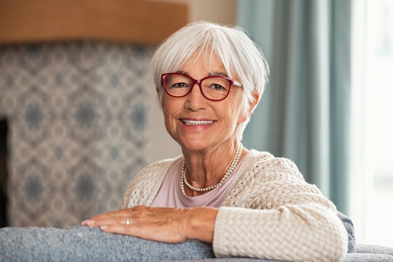 older woman with dental implants