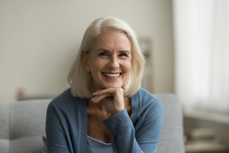 A smiling blond senior woman
