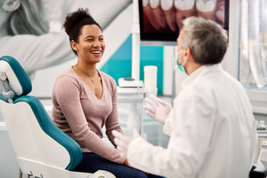 Patient talking to a dentist